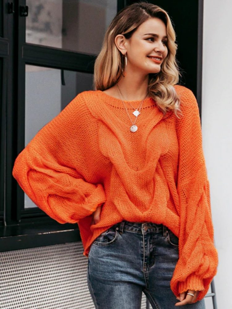 Pomarańczowy sweter oversize gruby warkocz z przodu 4