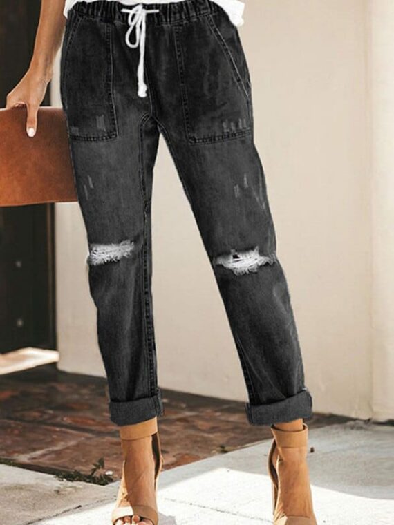 Damskie jeansy z przetarciami i wiązaniem w pasie w kolorze ciemny denim 1
