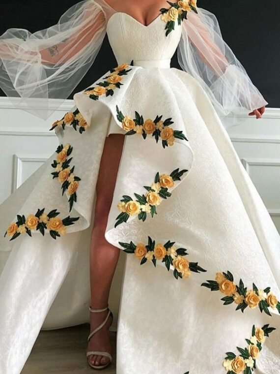 Kremowa suknia ślubna długi rękaw z haftem