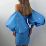 Niebieska sukienka z baloniastym rękawem w gwiazdki 1